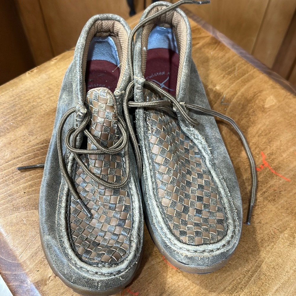 Woman’s leather twisted x boots worn one time